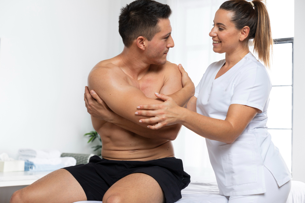 man-receiving-massage-during-physiotherapy-session.jpg